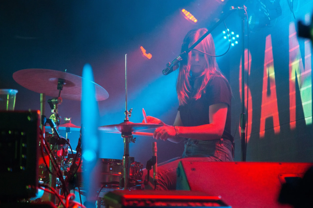 Woman playing drums