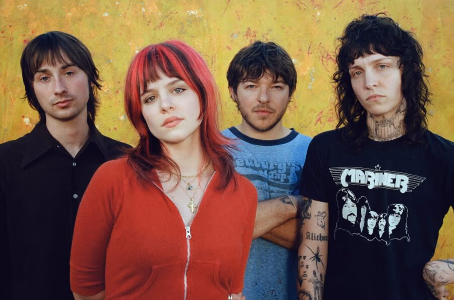 Bassist Alithea Tuttle, guitarists Desi Scaglione and Baron Rinzler, and drummer Cooper Ladomade.