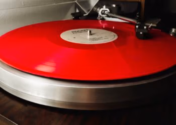 Picture of the album record "R Is For Rocket" by Rocket on a turntable