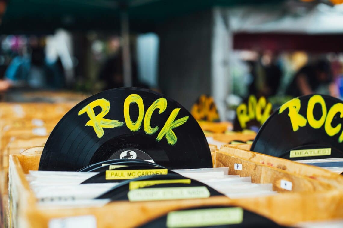 Bins of vinyl albums with dividers that say Rock