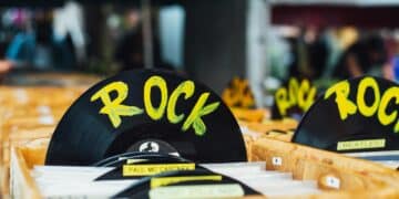 Bins of vinyl albums with dividers that say Rock
