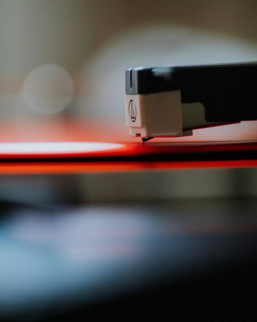 Turntable needle/cartridge on album
