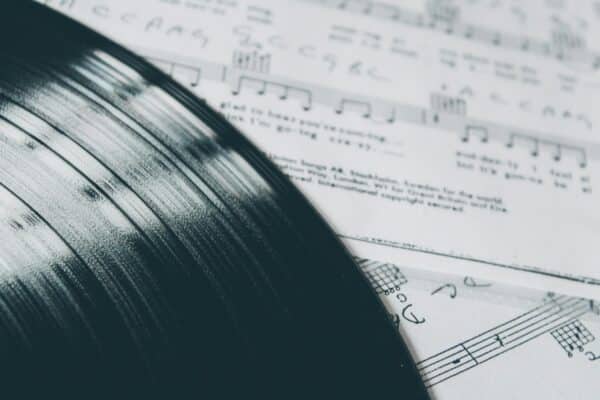 Vinyl album on sheet music